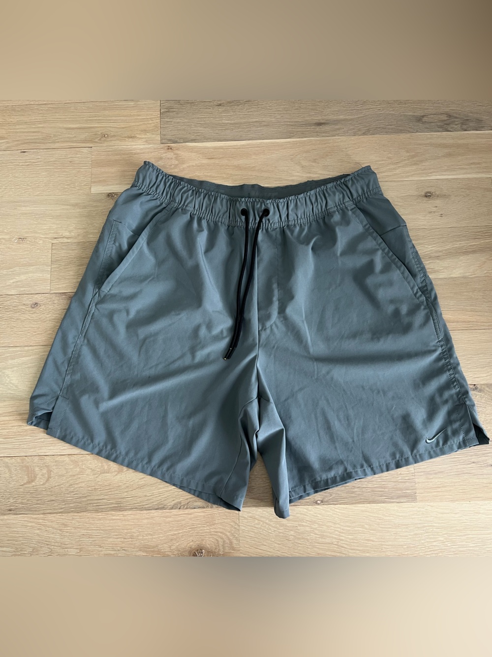 Nike Light Gray Dri-FIT Athletic Shorts with Black Swoosh
